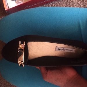 Gold and black flats