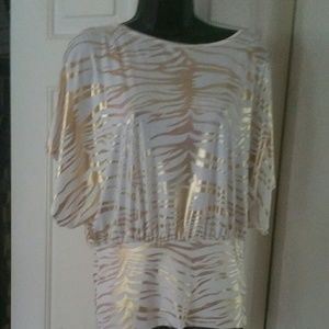 White and gold foil top