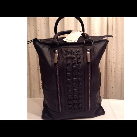 Looking for this Pringle purse.