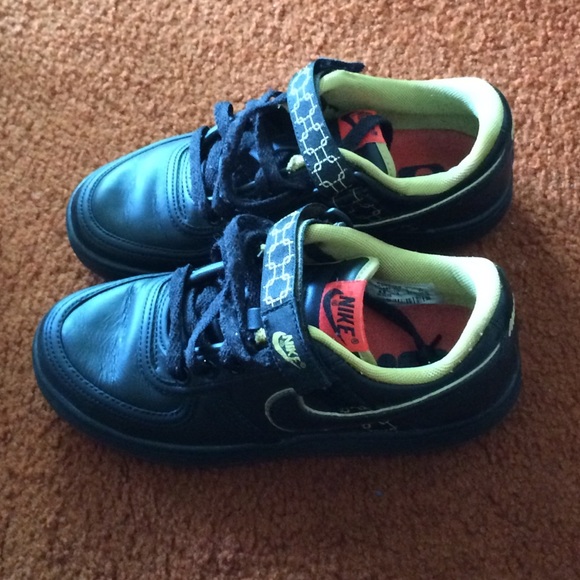 Black and Gold Nike shoes only worn a few times.