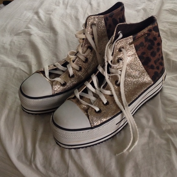 cheetah print sneakers with gold glitter.