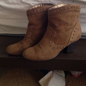 Light brown suede ankle boots.