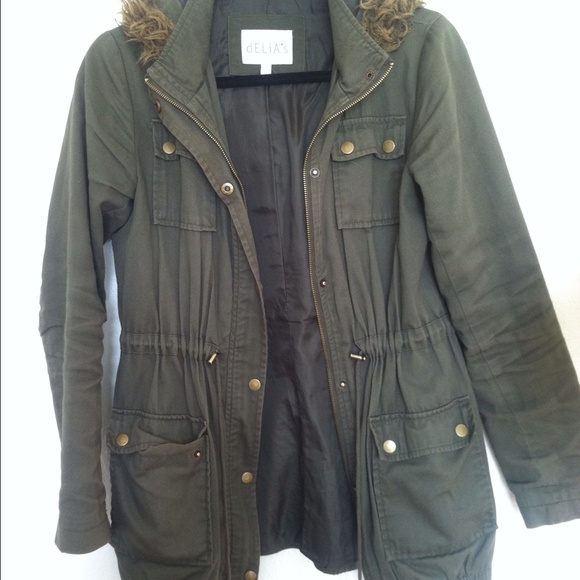Green parka with fur hood