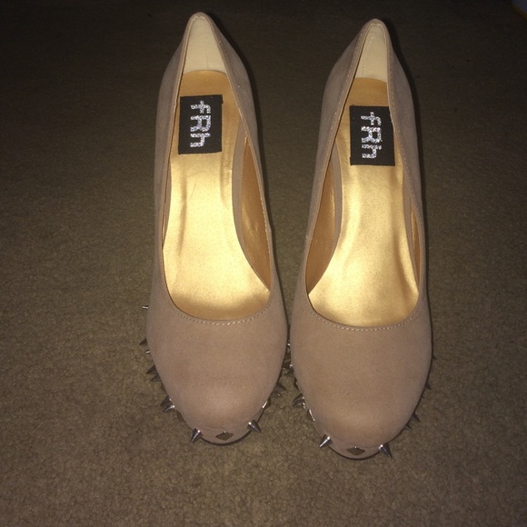 Beige spikes heels