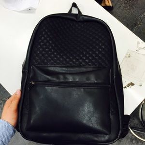 Quilted black backpack