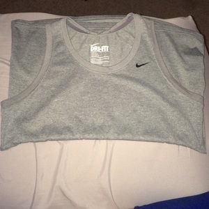 Grey Nike tank top.