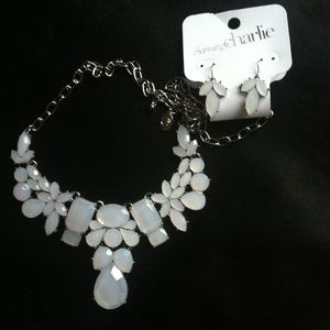 An earring and necklace set.