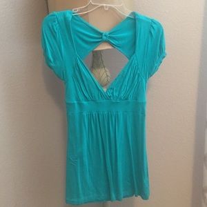 Low cut shirt with open back