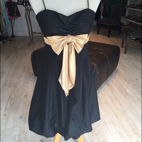 Dress with gold bow