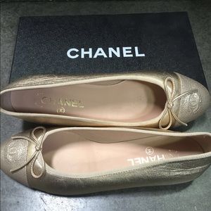 Chanel gold flats never worn