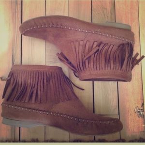 Tan fringe moccasins