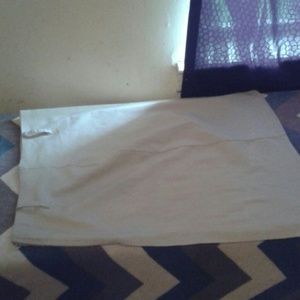 A khaki skirt w/ side split