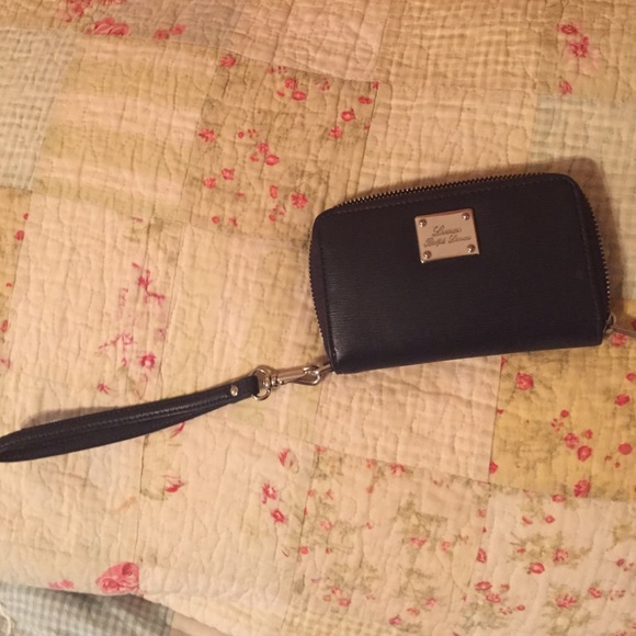 Ralph Lauren navy blue wristlet. Price negotiable