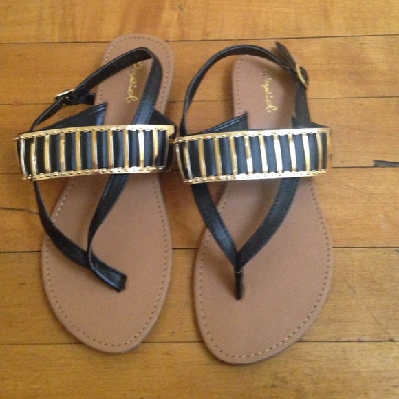 Black and gold sandals never worn