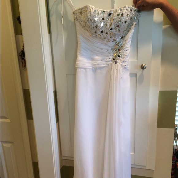 White and rhinestone pageant dress.