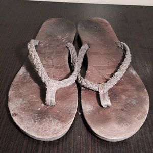 Distressed braided leather grey flip flops
