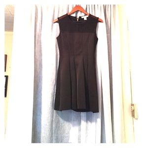 Black pleated skater style dress