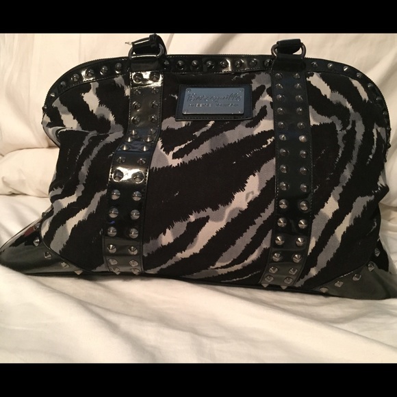 Zebra print, studded, black overnight bag