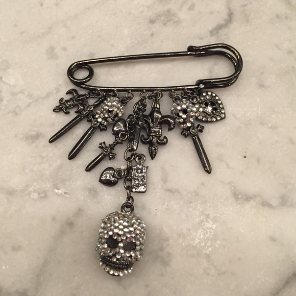 Skull and charm pin