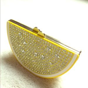 Kate spade lemon clutch.