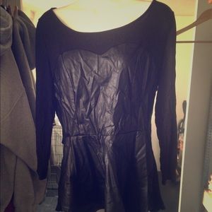 Peplum top in cotton/vinyl blend