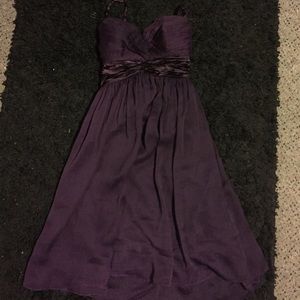 Eggplant color dress.