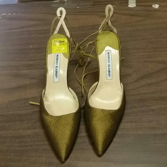 Manolo Blahnik gold lace ups