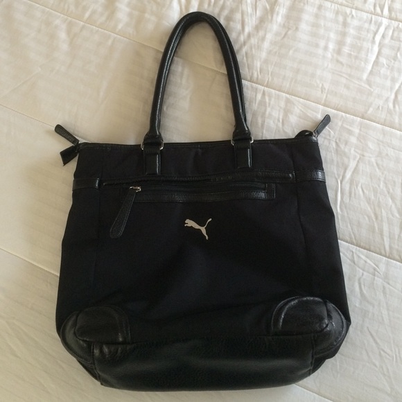 Very practical Puma handbag. Fits a small laptop!