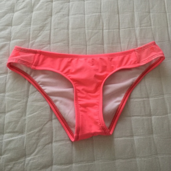 Neon pink bikini bottom.