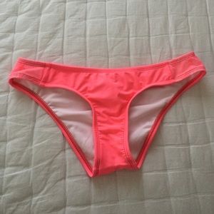 Neon pink bikini bottom.
