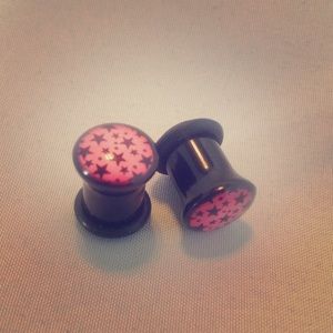 Size 0 black & pink star plugs