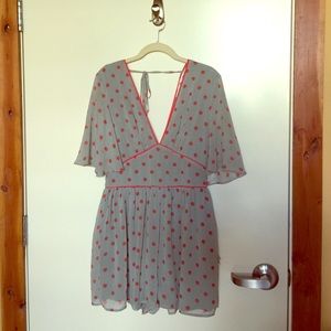 Blue and orange polka dot deep V romper