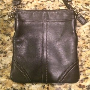 COACH- Black leather cross body coach purse.