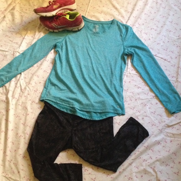 Blue Danskin "Dri-More" shirt. Semi fitted