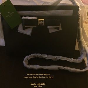 Kate Spade: 	
MONTFORD PARK SMOOTH ANGELICA