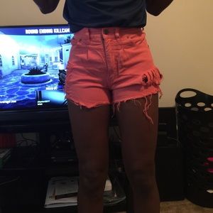 Pink distressed, high waisted shorts