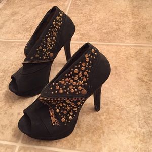 Black and gold heels