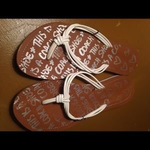 COACH leather flip flops