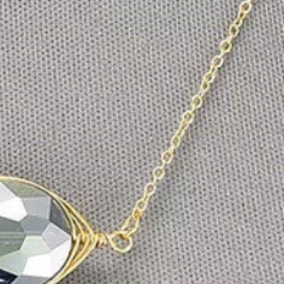 Oval Shaped Clear Pendant Wrapped In Gold - Picture 4 of 4