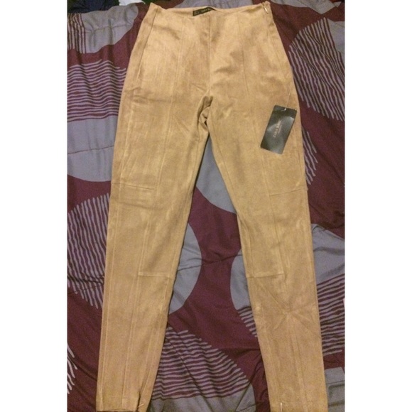 High-waisted tan suede skinny pants