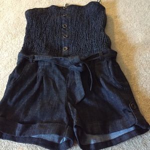 Denim jumpsuit , great for the summer .