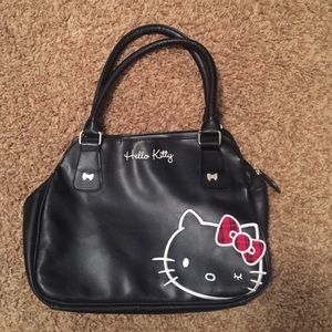 Hello kitty purse, plaid on the inside