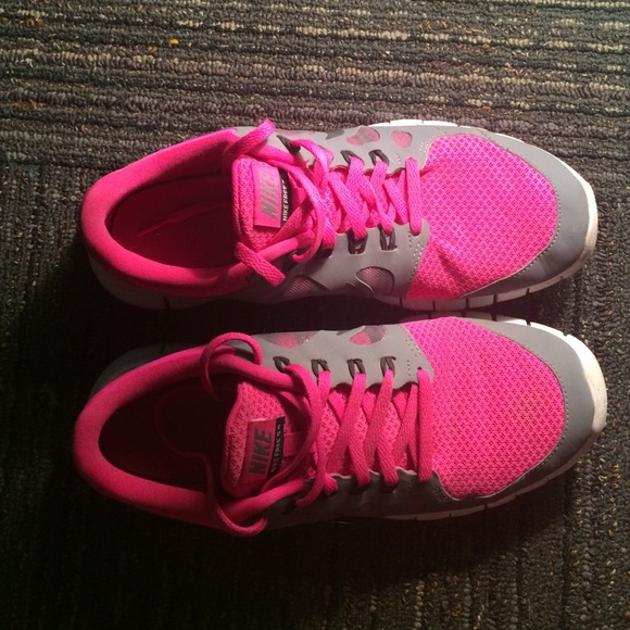 Pink/Gray Nike free runs 5.0