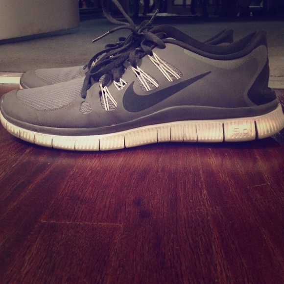 Grey Nike free runs in awesome condition for sale