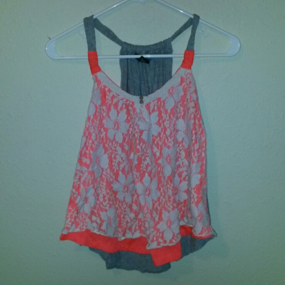 Neon pink tank top, with white flower lace.