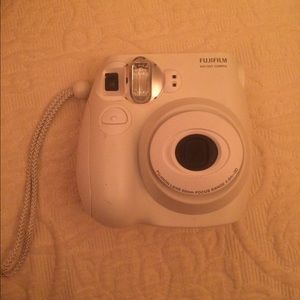 White Polaroid comes in box.