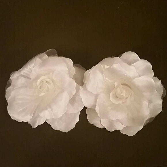 White flower pins