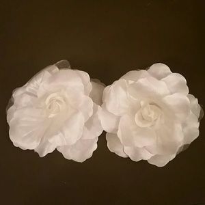 White flower pins