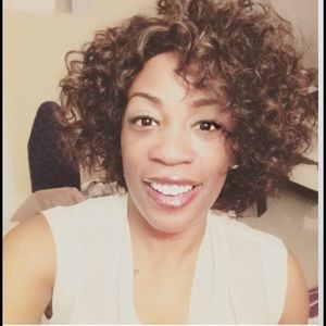 Lace front curly human hair wig.