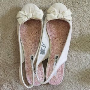 Beige flats with bows